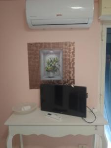 TV a/nebo společenská místnost v ubytování B&b Cleopatra