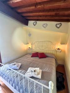 Postel nebo postele na pokoji v ubytování Agriturismo Tassinaia