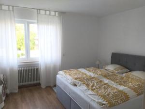 Postel nebo postele na pokoji v ubytování Helle 4 ZKB mit Balkon in Wittlich