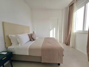 Postel nebo postele na pokoji v ubytování Sopramonte Exclusive Rooms + 37 fotografií