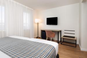 Posteľ alebo postele v izbe v ubytovaní Exe Vienna