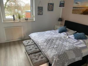Postel nebo postele na pokoji v ubytování Dieks-Inn By Tanny