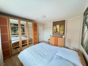 Llit o llits en una habitació de Central City Apartment Cloppenburg