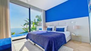 Postel nebo postele na pokoji v ubytování Villa Lilian by LovelyStay + 45 fotografií