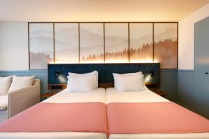 Cama ou camas em um quarto em Montebelo Viseu Congress Hotel & Spa