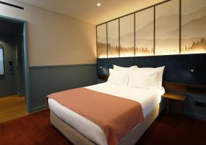 Cama ou camas em um quarto em Montebelo Viseu Congress Hotel & Spa