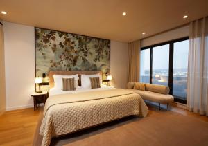 Cama ou camas em um quarto em Montebelo Viseu Congress Hotel & Spa