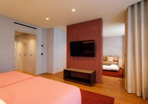Cama ou camas em um quarto em Montebelo Viseu Congress Hotel & Spa