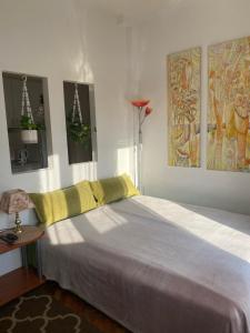 Postel nebo postele na pokoji v ubytování Penthouse Modena