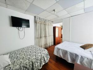 Un pat sau paturi într-o cameră la OROSHEAM