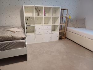 Postel nebo postele na pokoji v ubytování Apartmán Dvořák 194 pod Svatou horou