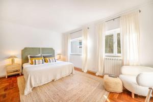 En eller flere senge i et værelse på Casa Rosário - Three Bedroom Villa with Private Pool