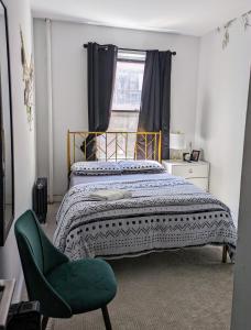 Ein Bett oder Betten in einem Zimmer der Unterkunft Oasis Apartment in the Heart of Union Square Downtown Manhattan