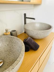 a bathroom with a sink on a wooden counter at Appartement 6 personnes hyper-centre de Tours in Tours