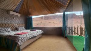 Postel nebo postele na pokoji v ubytování Sultan Luxury Camp