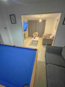 an overhead view of a living room with a couch at Spacious home with free parking in Shirley