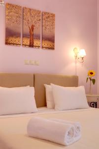 Postel nebo postele na pokoji v ubytování Byzantinon Hotel