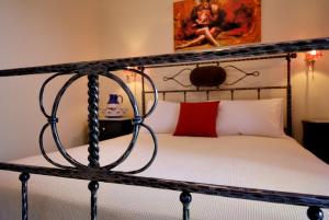 Postel nebo postele na pokoji v ubytování Byzantinon Hotel