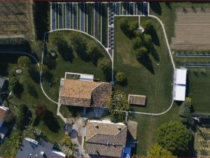 an overhead view of a house with a yard at Sacramora in Faenza
