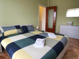 Vuode tai vuoteita majoituspaikassa View and Relax