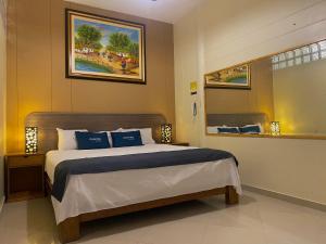 Uma cama ou camas num quarto em Suite Apart Miraflores