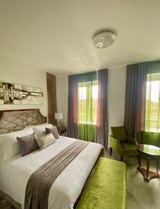 Una cama o camas en una habitación de Guesthouse Villa Vice