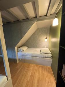 Letto o letti in una camera di La Maison du bonheur - Gîte RULINA - Corancy