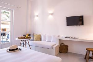 A television and/or entertainment centre at NESEA Boutique Apartments