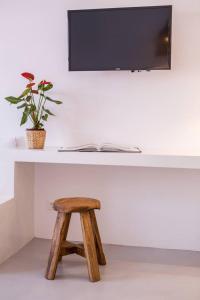 A television and/or entertainment centre at NESEA Boutique Apartments
