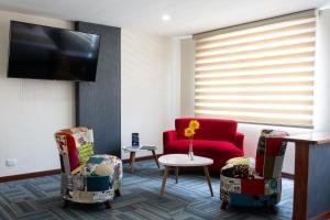 TV a/nebo společenská místnost v ubytování Hotel Risot