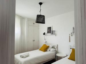 Posteľ alebo postele v izbe v ubytovaní Charming & cosy beach apartment