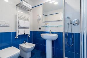 Koupelna v ubytování Hotel Sorriso