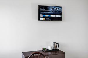 TV a/nebo společenská místnost v ubytování Hotel Sorriso