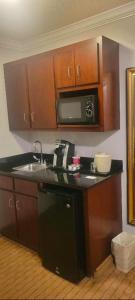 A kitchen or kitchenette at The Arc Hotel