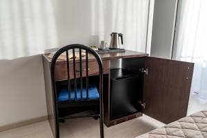 Postel nebo postele na pokoji v ubytování Hotel Sorriso