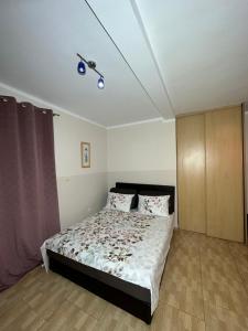 Uma cama ou camas num quarto em Apartmani Simona