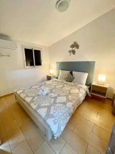 Postel nebo postele na pokoji v ubytování Villa TiCazMimose