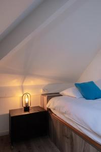 Letto o letti in una camera di B&B De Joker