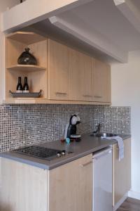 Cucina o angolo cottura di B&B De Joker