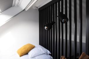 Letto o letti in una camera di B&B De Joker