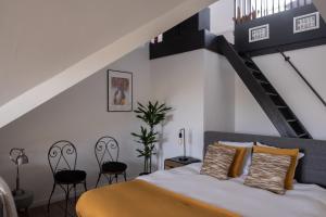 Letto o letti in una camera di B&B De Joker