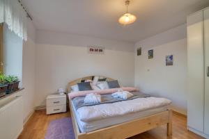 Postel nebo postele na pokoji v ubytování Robida + 6 fotografií