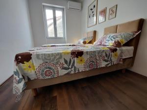 Postel nebo postele na pokoji v ubytování Beach Apartment Lana