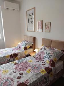 Postel nebo postele na pokoji v ubytování Beach Apartment Lana
