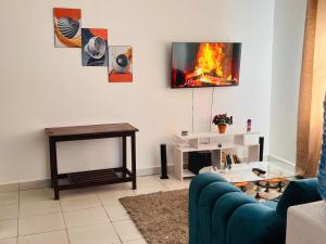 TV a/nebo společenská místnost v ubytování Gianna’s Stays