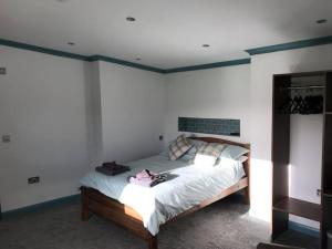 Voodi või voodid majutusasutuse Kingarth Hotel toas