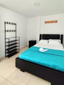 Katil atau katil-katil dalam bilik di Hermoso apartamento en Popayán
