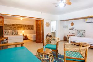 Postel nebo postele na pokoji v ubytování Hotel Isla del Sol
