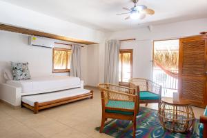 Postel nebo postele na pokoji v ubytování Hotel Isla del Sol