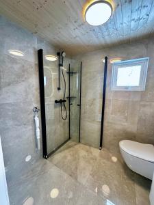 Koupelna v ubytování Kvalvika Retreat - Lofoten